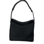 Cole Haan  collaborate with Estee’ Lauder shoulder bag. Photo 0