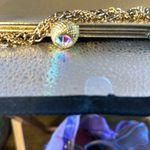 Small handbag you can carry as a clutch or with the metal strap. Photo 2