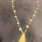 Light yellowish green teardrop stone with little stones and beads chain clasp Photo 2