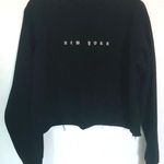 Brandy Melville black New York cropped raw hem sweater Photo 0