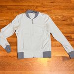 Athleta  Women’s Medium Gray Zipper Pockets Lightweight Athletic Jacket Sporty Photo 3