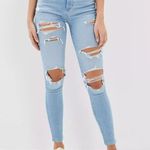 American Eagle  Super Hi-Rise Jegging Light Wash Distressed Photo 0