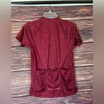 Pearl Izumi Red Cycling Jersey. Size Medium. With 3 pockets on back. Photo 7