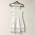 Alexis  Sleeveless Lace Trim Pleated Fit & Flare Mini Dress White Women's Size S Photo 1