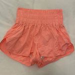Free People FP Movement // Women's The Way Home Activewear Shorts, Neon Coral Photo 1