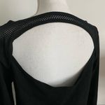 Fabletics  • Solid Black Long Sleeve Mesh Neck Cutout Back Top Photo 3