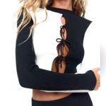 ZARA Bow trim knit sweater
Black and White Photo 0