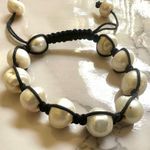 Pearl bracelet on adjustable black silk cord Photo 7