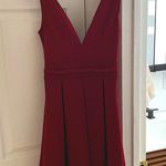 Boohoo  Maroon sleeveless mini dress with skater skirt and deep v neck Photo 3