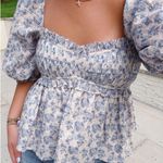 Boutique Floral babydoll top  Photo 0