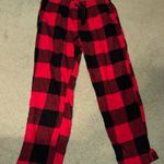 Old Navy  Women’s PJ pants that are red and black Medium Photo 0