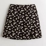Hollister high waisted floral/daisy print Girl’s ultra mini skirt size Medium Photo 0