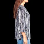 Gloria Vanderbilt Maurice’s cute black and white tunic with bell sleeves! New Photo 2