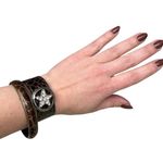 Set of Two Leather Bracelets with Star and Giraffe Print Design Photo 1