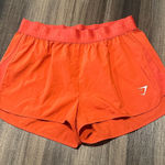 Gymshark Women's Orange Athletic Shorts Photo 0