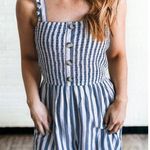Andree by Unit  Destin to be blue & white striped smocked faux button romper Photo 0