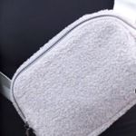 PURPLE FLEECE SHERPA CROSSBODY FANNY PACK Photo 1