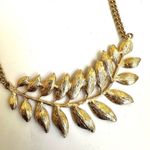 ALDO  gold tone feather leaf pendant necklace Photo 4