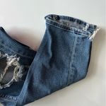 American Eagle  Outfitters • Medium Wash Destructed Mom Jeans Photo 1