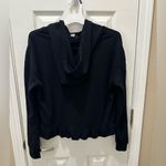 Free Press  flirty ruffle bottom hoodie black size Medium Photo 2