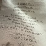 Isalis  Ribbed top curved hem cut out back size medium Photo 13