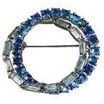 Vintage Aurora Borealis baguette rhinestone inter woven circle brooch. Blue Photo 0