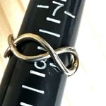 Infinity Twist Band Ring Photo 4
