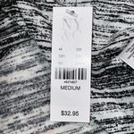 NY&C women’s size medium tank shark bite hem split sides black and white design Photo 9