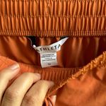 Athleta  Coral Midi arrival travel Skirt size 12 new NWT Photo 1