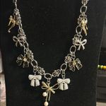 Elegant Silver and Gold Bow Necklace Photo 0