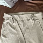 Tan dress pants with tie waist Photo 1