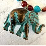 Brass elephant pendant necklace with carnelian, turquoise and red jasper beads Photo 10