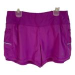 Athleta women's fuchsia athletic shorts size small panty lined and pockets Photo 2
