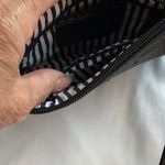 Charming Charlie Black Textured Wristlet with Tassel Photo 2