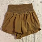 Aerie smocked mustard yellow shorts, size medium Photo 1