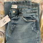 Muse Looks Distressed Mid Rise Slim Flared Classic Fit Mom light wash Jeans Blue Size undefined Photo 9
