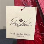 Patricia Nash  | Leather Wristlet w/ Tooled Design in “Lava” Photo 1