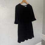 CeCe  Elegant Black Garment Photo 1