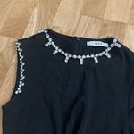 Area black asymmetrical jumpsuit with crystal embellishment Photo 4