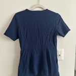 Jaanuu  navy scrub top size small Photo 1