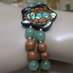 LEE SANDS Brown Photo 2