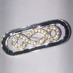 Elegant Vintage Silver Tone Rhinestone Infinity Brooch Photo 1