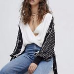Free People  Auxton Thermal Wrap Top with a floral print Photo 3