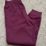 Nike  Standard Fit Tapered Leg Sweatpants Photo 0