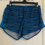 Nike NWOT |  women’s blue print running active shorts —‎ small Photo 0