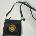 Vintage 90s 1990s retro Black Crossbody with Sun Medallion faux black leather Photo 0