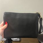Coach  Black Wristlet with Gold Zipper Photo 1