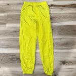 Urban Outfitters  Ashley Neon Yellow Nylon Jogger Pants Women’s Small Photo 1