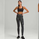 Lululemon ‎ Size 6 Wunder Train High Rise Tight Black Iridescent Foil Full Length Photo 4