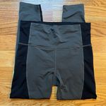Athleta gray black and lime green leggings size medium Photo 1